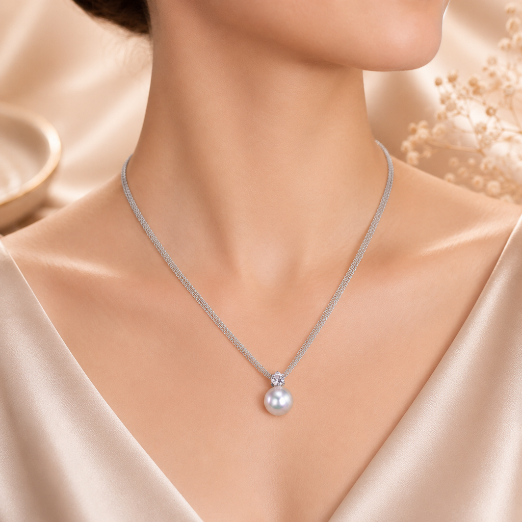 Amour  11-12mm Cultured Freshwater Pearl and 5/8 CT TGW White Topaz Pendant with Chain In Sterling Silver